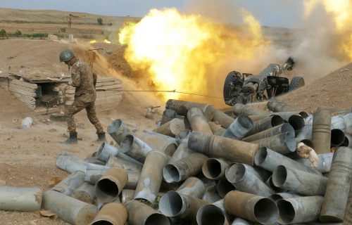 In this Sunday, Oct. 4, 2020 photo, an Armenian soldier fires an artillery piece during fighting with Azerbaijan's forces in self-proclaimed Republic of Nagorno-Karabakh, Azerbaijan. Sunday, Oct. 4, 2020. Heavy fighting between Azerbaijani and Armenian forces in the region since Sept. 27 has since killed scores of troops and civilians. Nagorno-Karabakh lies inside Azerbaijan but has been under the control of ethnic Armenian forces backed by Armenia since the end of a separatist war in 1994. The clashes have continued despite numerous international calls for a cease-fire.