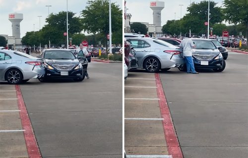 Bizarna scena na parkingu: Telom pokušao da zaštiti kola od udaraca i štete (VIDEO)